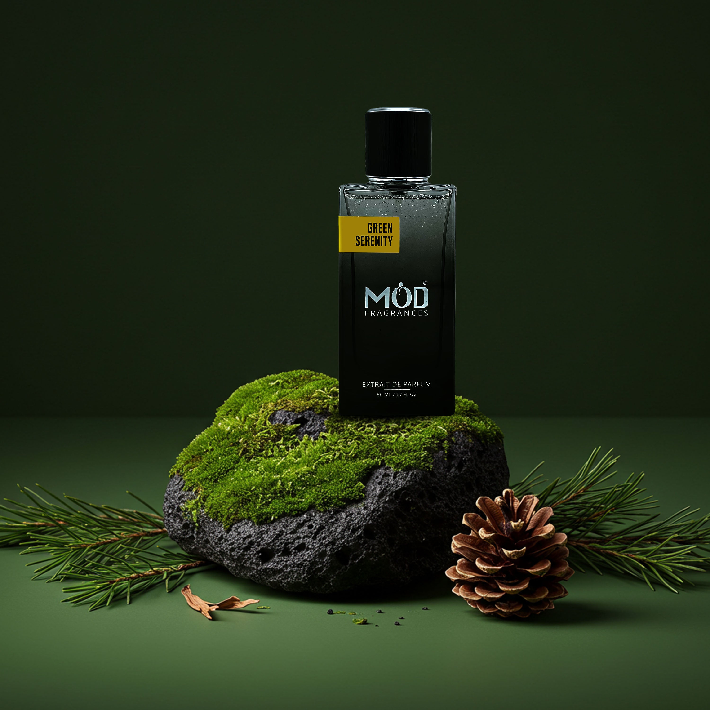 Inspired by Matcha 26 Perfume Dupe Möd Parfums Green Serenity perfume bottle on a green background with moss and pine cones.