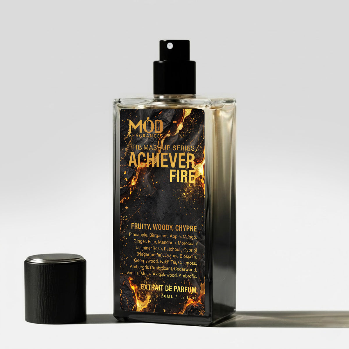 Achiever Fire Perfum Bottle Mod Fragrances The Mashup Series. Black color. Aventus, Blue Talisman and God of Fire Hybrid Perfume Spray with Cap on Floor