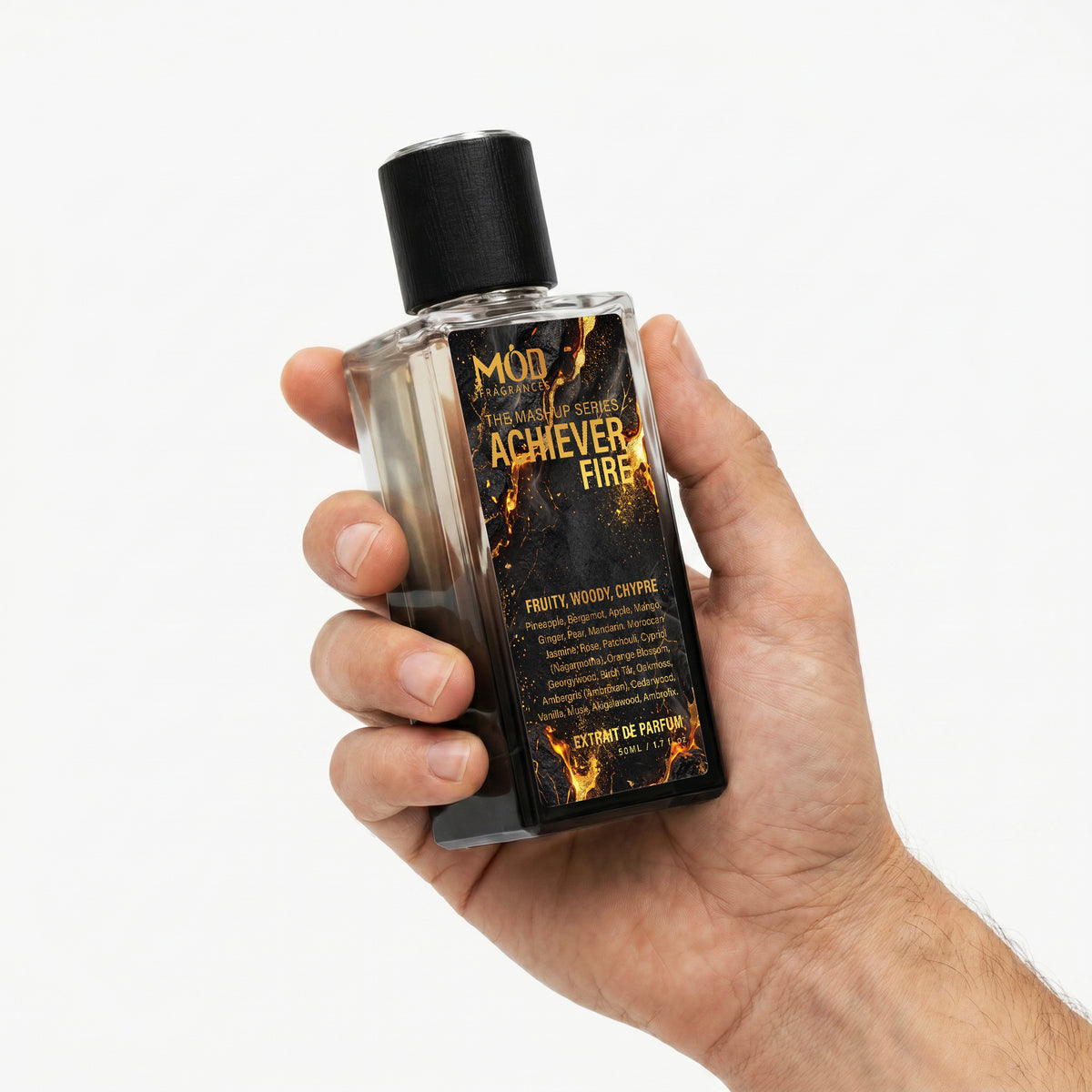 Achiever Fire Perfum Bottle Mod Fragrances The Mashup Series. Black color. Aventus, Blue Talisman and God of Fire Hybrid Male hand holding