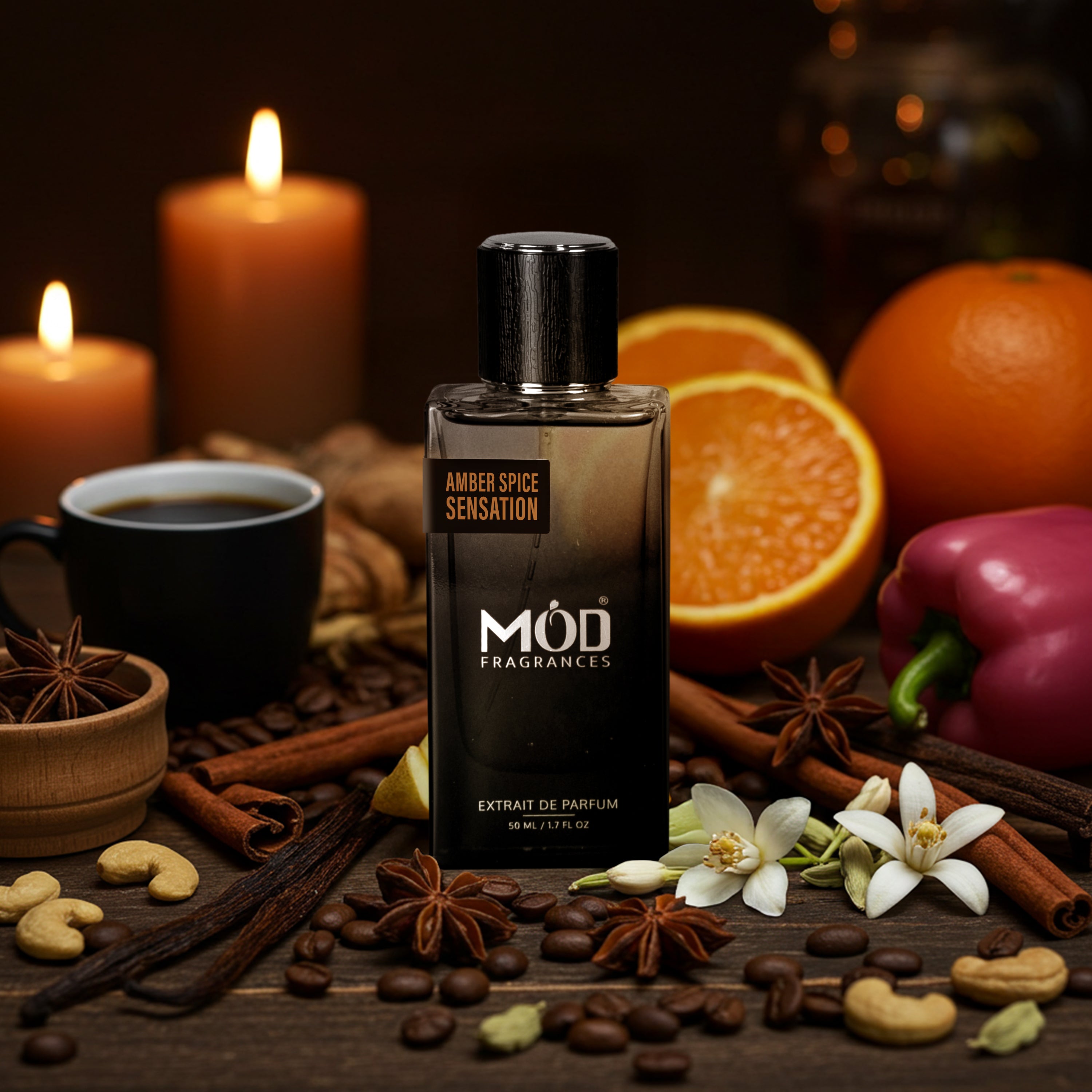 MOD Fragrances Amber Spice Sensation perfume bottle with coffee, oranges, and spices on a dark background