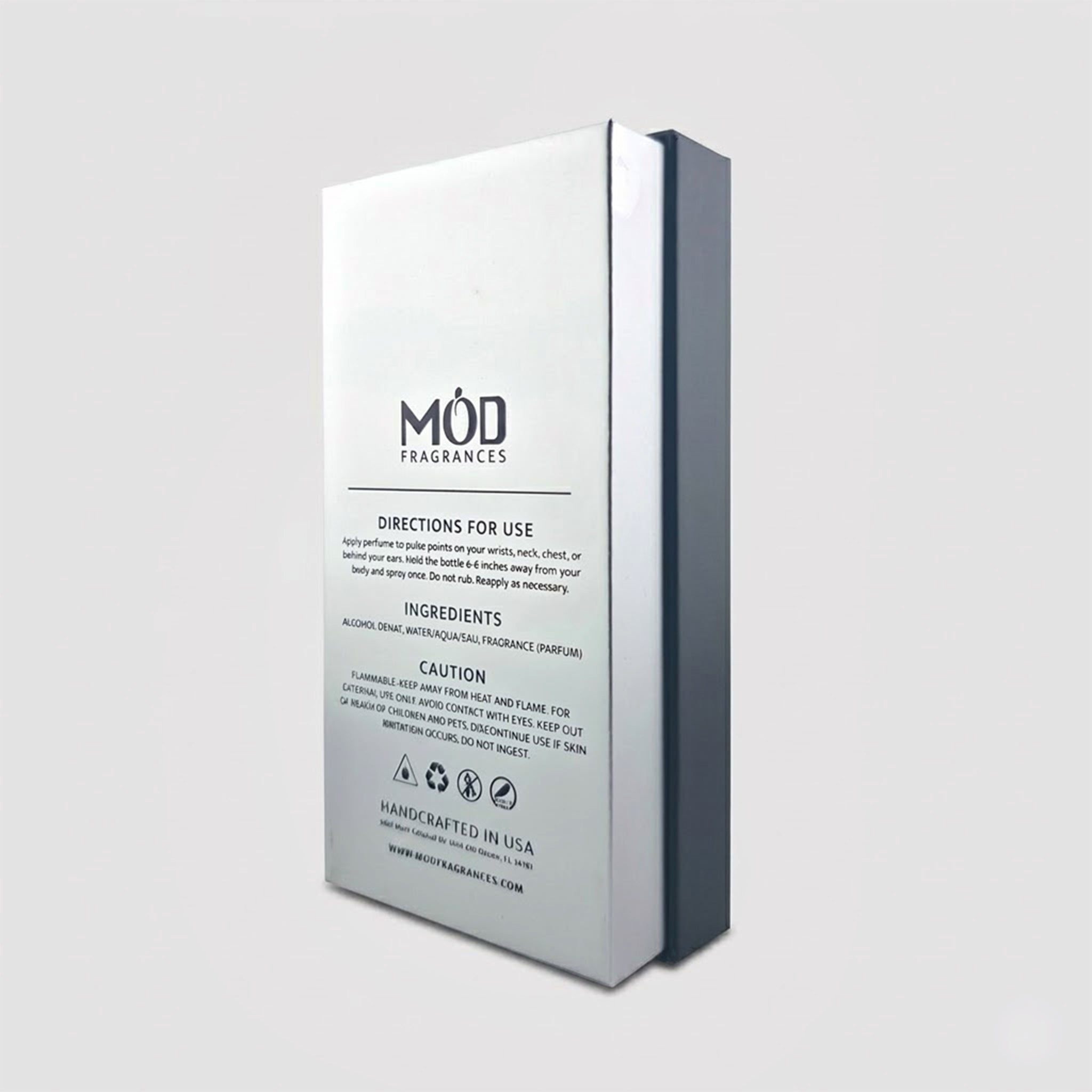 The back of a white perfume box features the MOD Fragrances logo at the top, followed by "Directions for Use," "Ingredients," and "Caution" text, with small safety icons and "Handcrafted in USA" at the bottom.