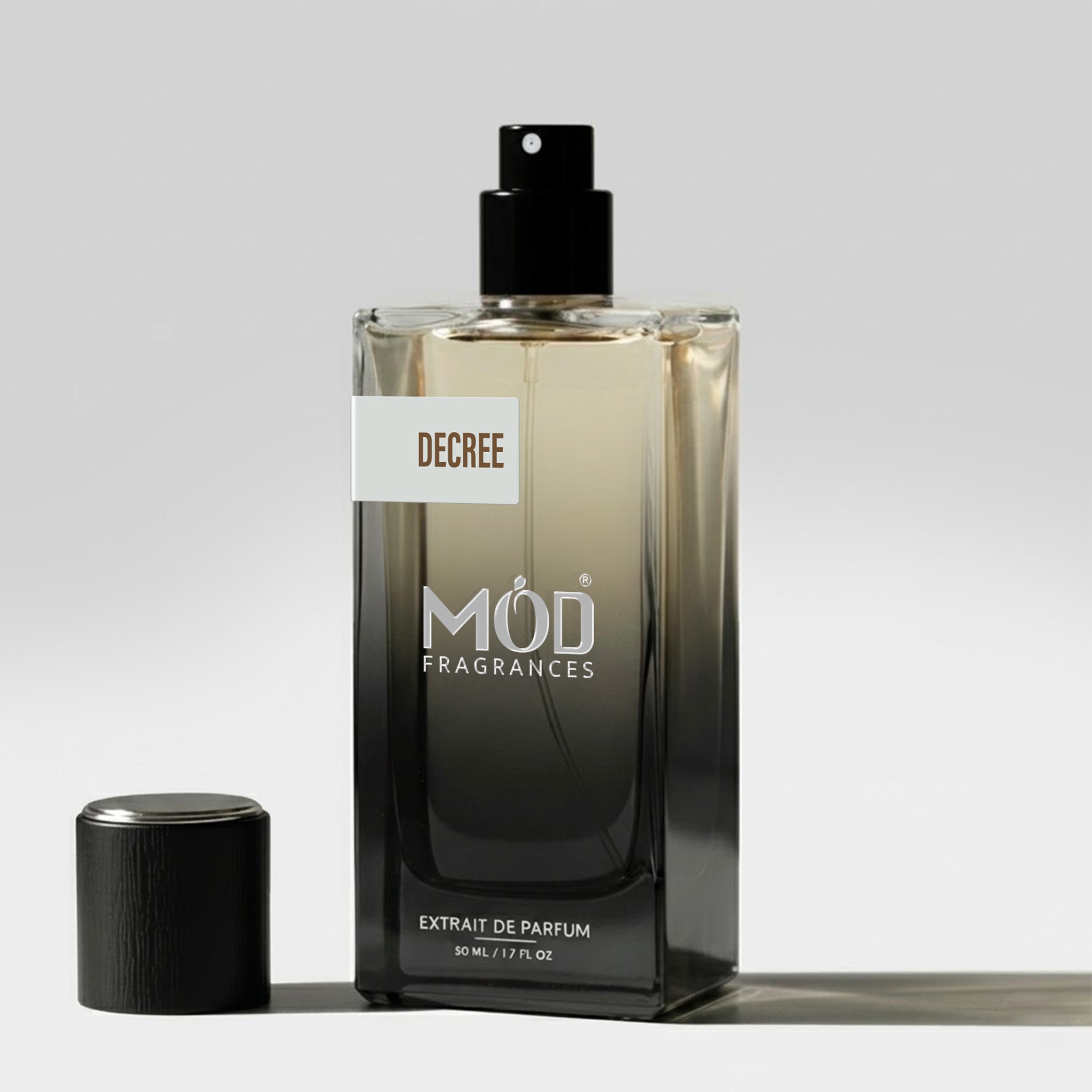 Perfume bottle labeled 'Inkognito' by 'MOD Fragrances' on a light gray background