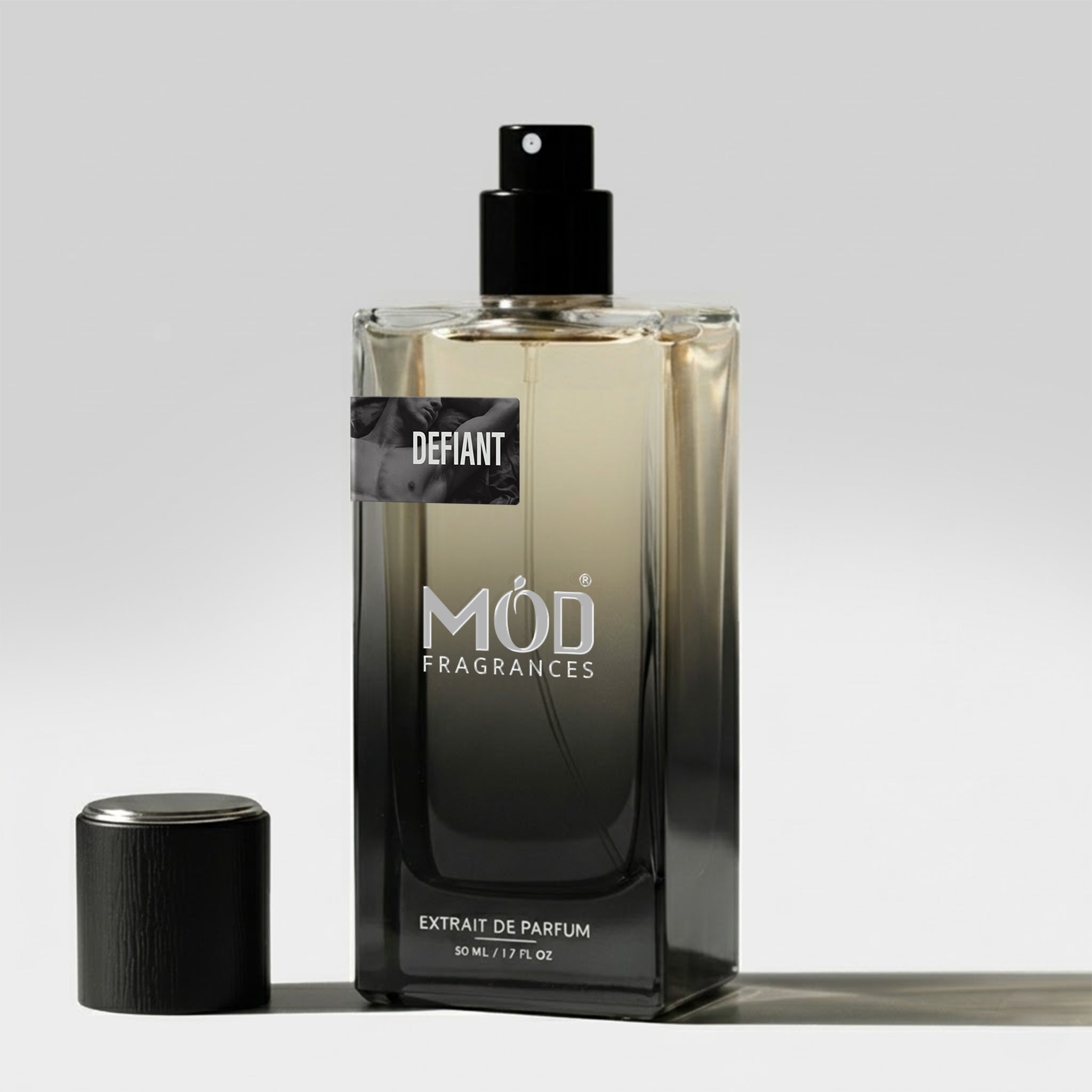 Perfume bottle labeled 'MOD Fragrances' on a light gray background