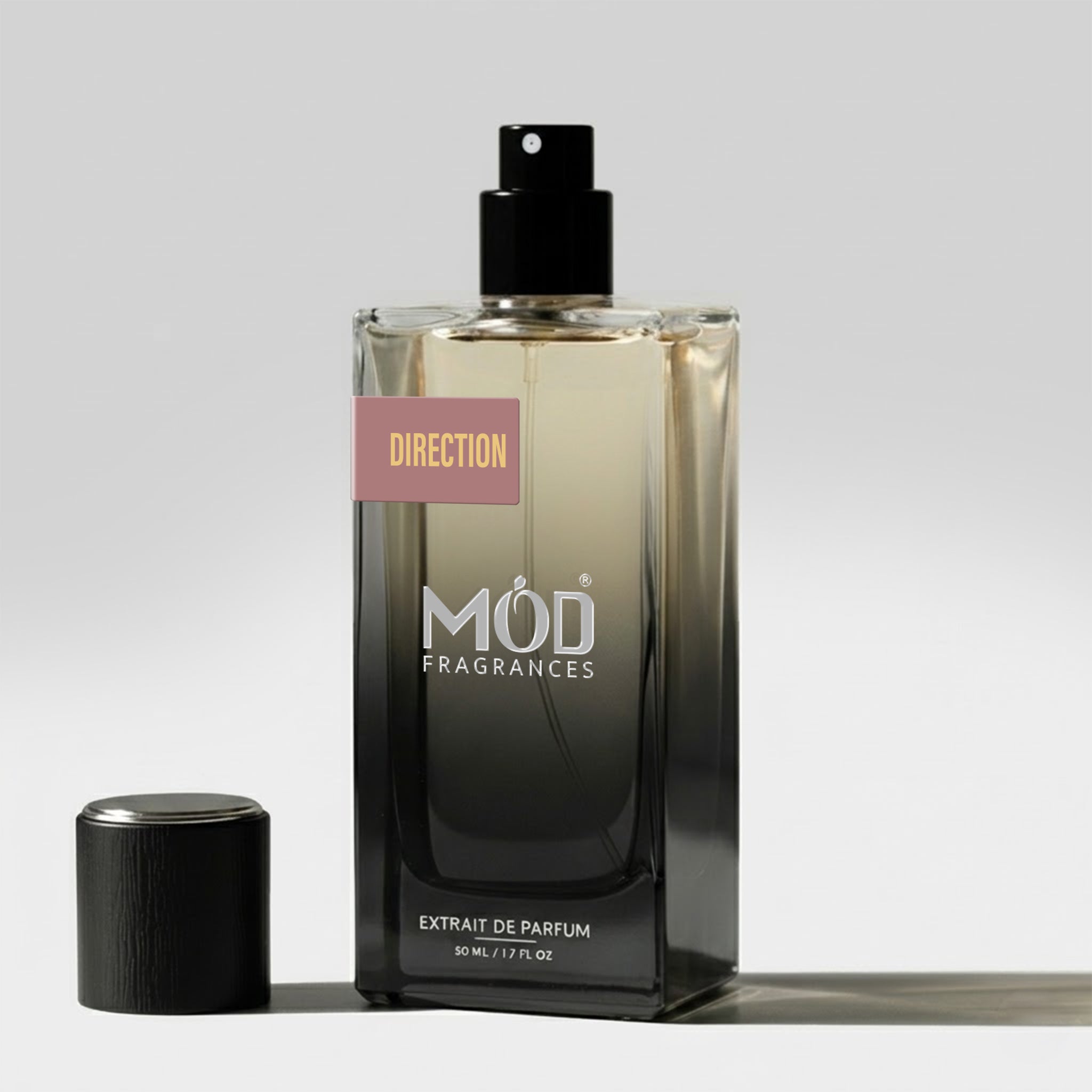 MOD Fragrances perfume bottle with 'Direction' label on a light gray background