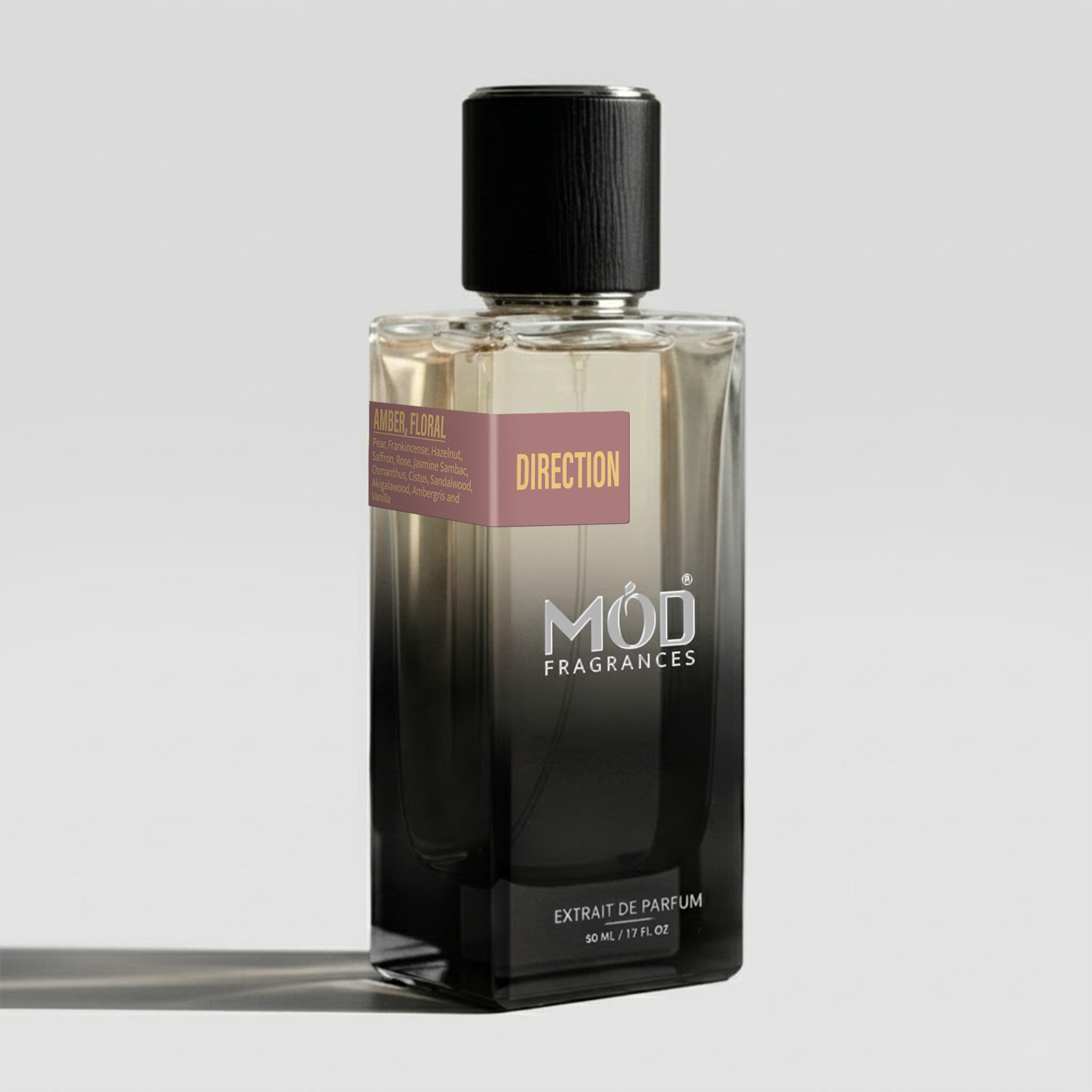 Perfume bottle labeled 'MOD Fragrances' on a gray background