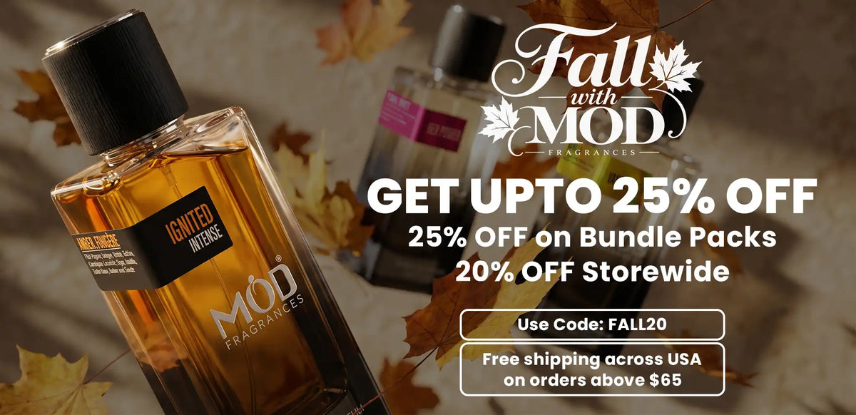 Promotional banner for MOD Fragrances featuring a bottle of Ignited Intense cologne in the foreground, with additional bottles blurred in the background and autumn leaves scattered around. Large text advertises fall bundle pack discounts and storewide savings.