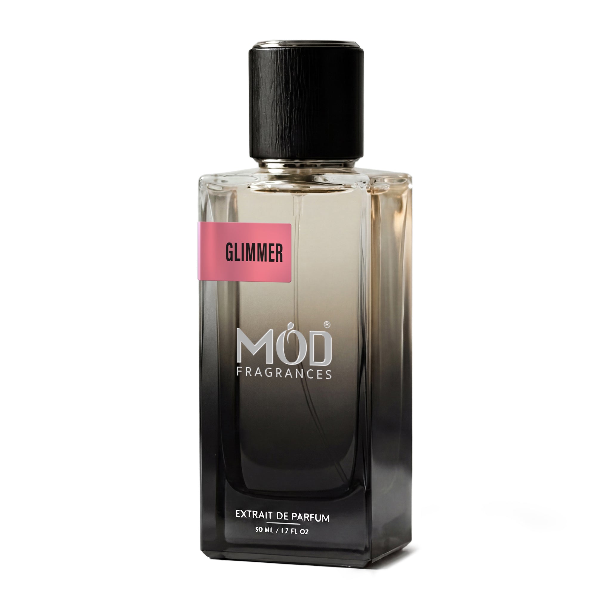 A rectangular glass perfume bottle by MOD Fragrances, labeled “Glimmer” stands centered against a plain white background, featuring a black cap and a gradient black-to-clear glass finish.