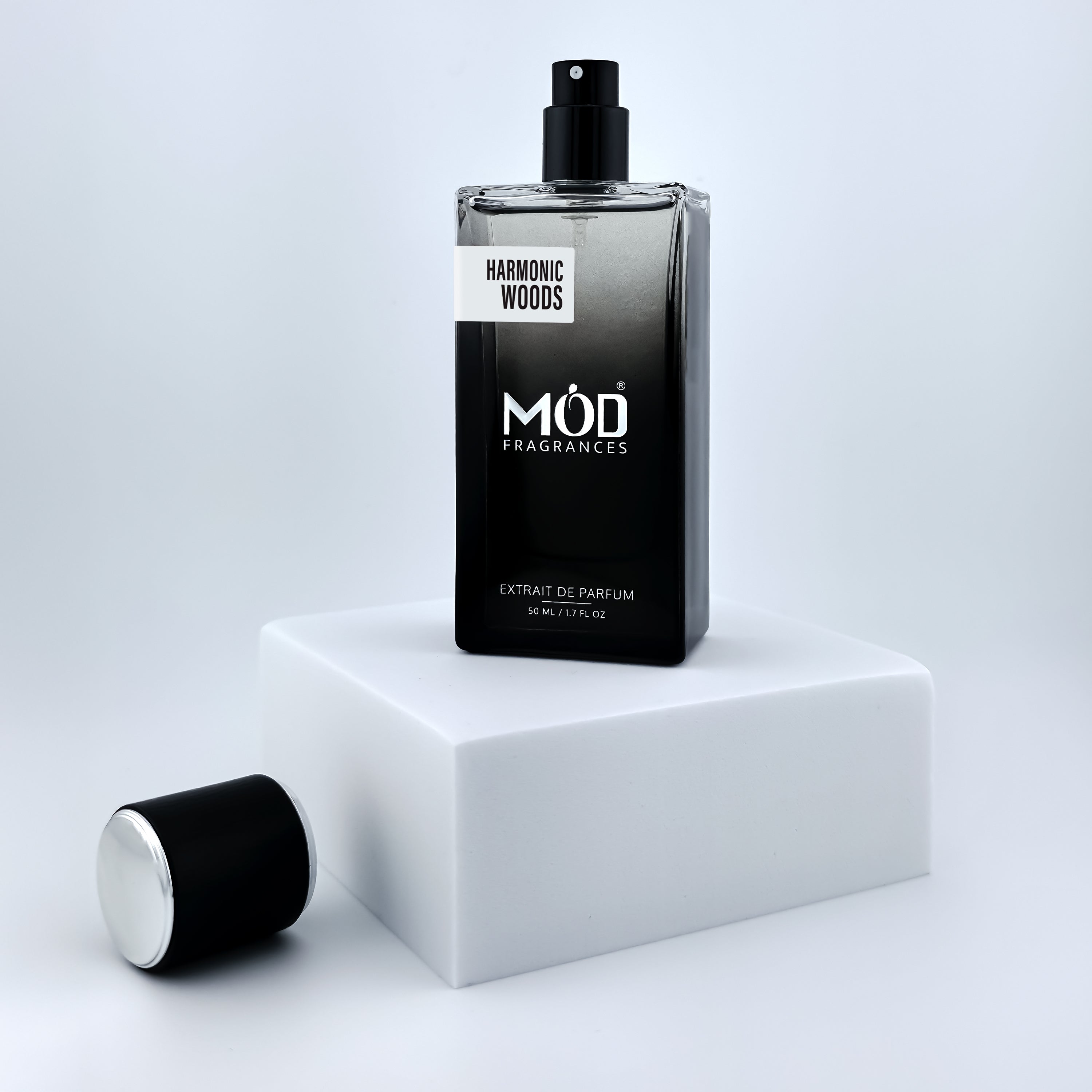 Perfume bottle labeled 'Veil of Thirst' by MOD Fragrances on a white platform with a light gray background