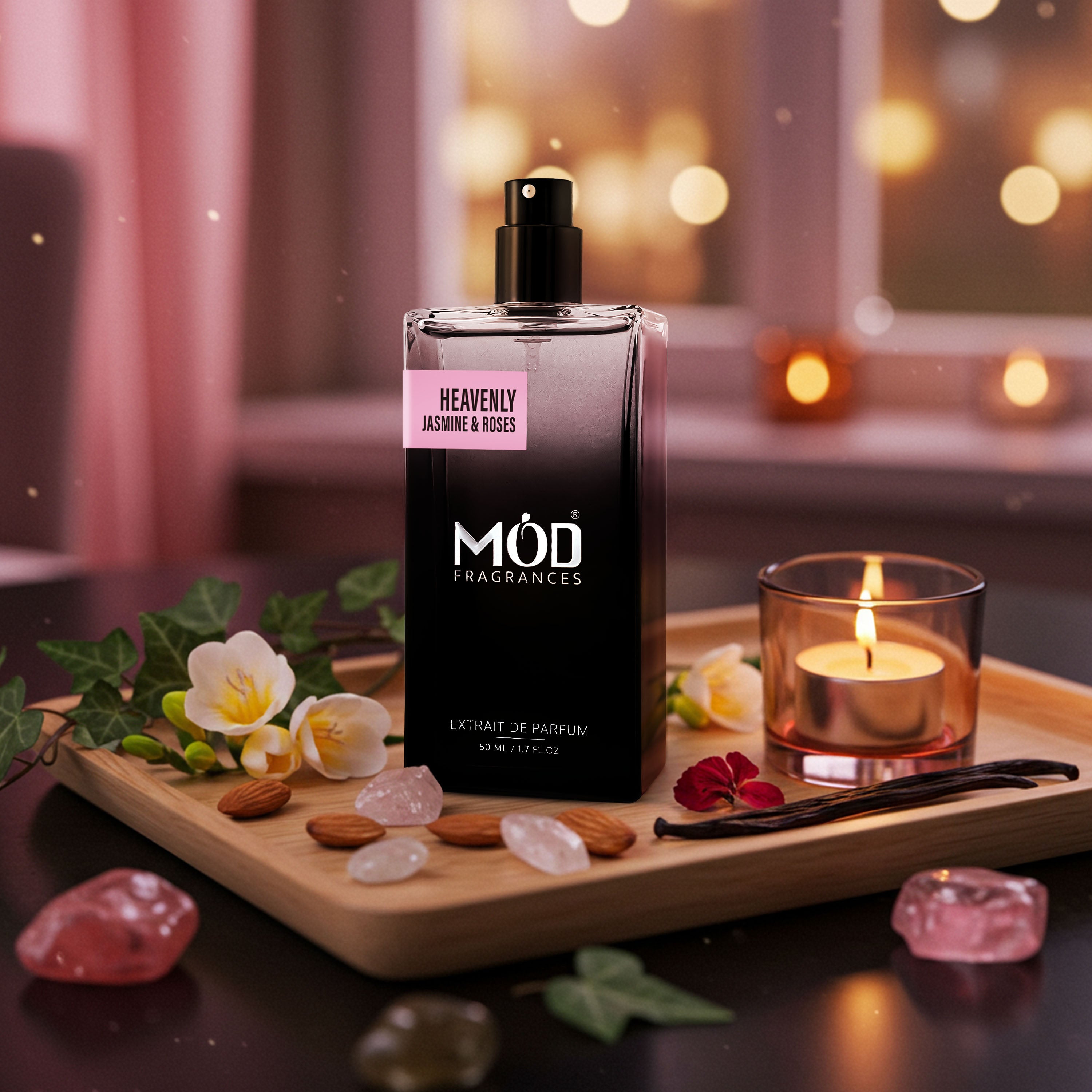 Möd Fragrances bottle on a wooden tray with candles and flowers