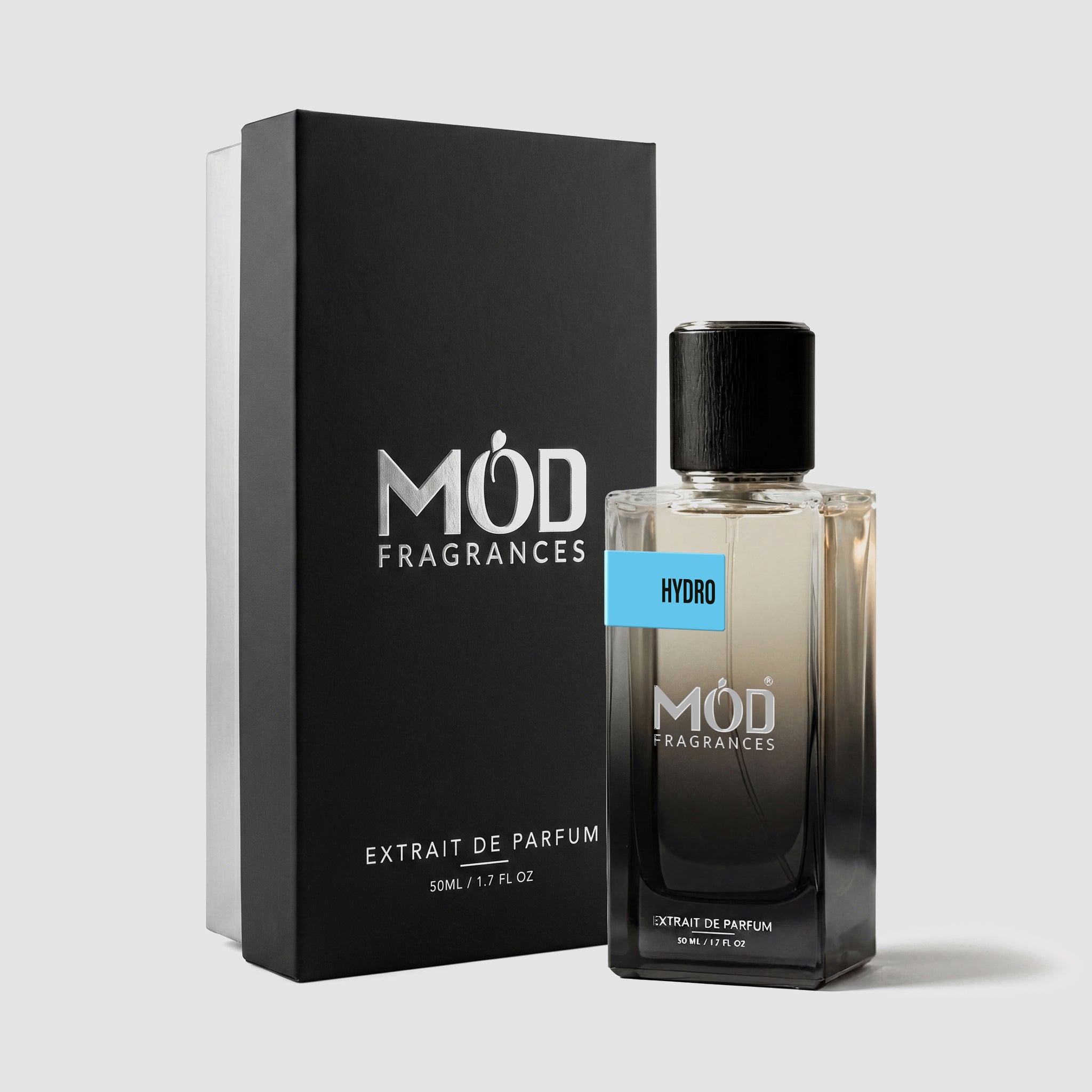 MOD Fragrances 50ml, premium perfume bottle and box of "Hydro" fresh & aromatic fragrance for men, inspired by "Invictus Aqua", placed vertically on white background.