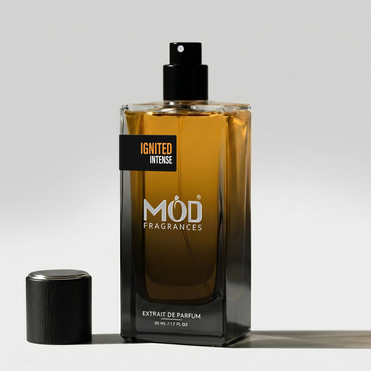 Perfume bottle labeled 'Raw Leather' by MOD Fragrances on a light gray background