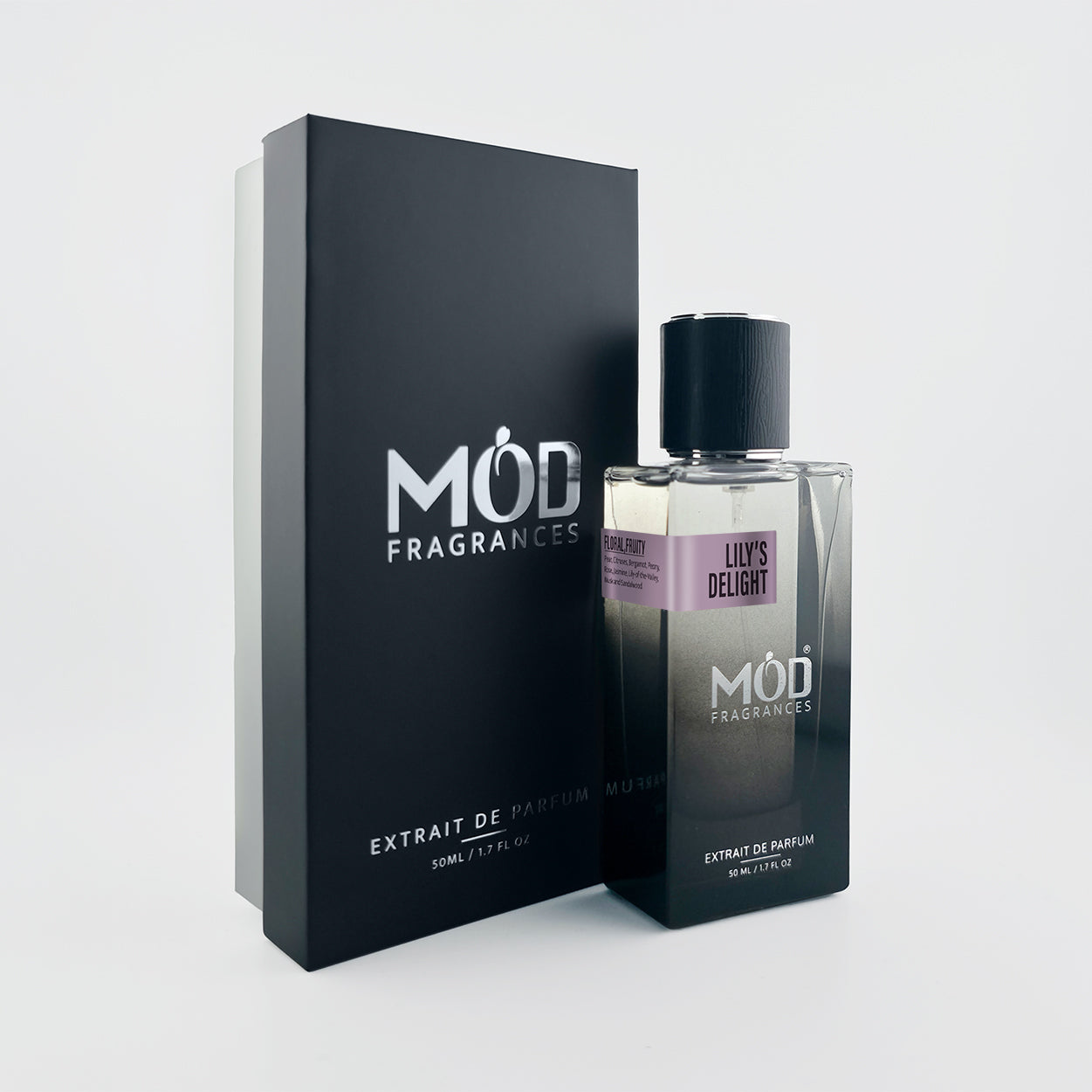 A bottle of MOD Fragrances 'Lily's Delight' extrait de parfum next to its black presentation box, set against a clean light gray background.