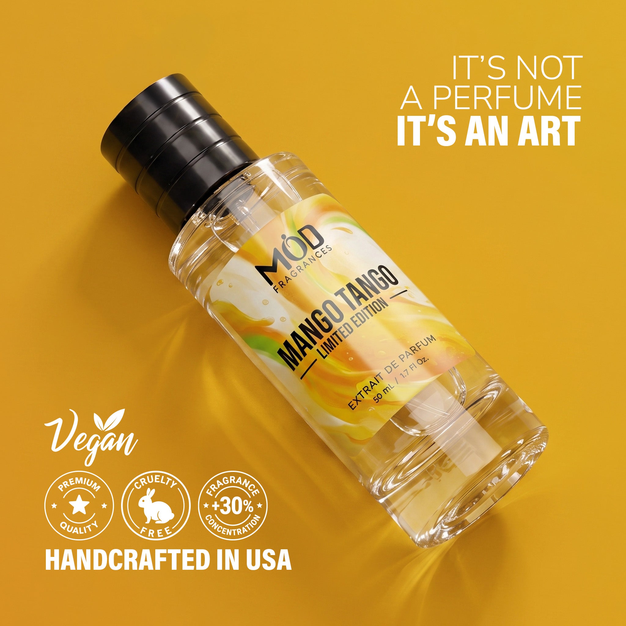 A clear cylindrical bottle of MOD Perfumes Mango Tango Limited Edition Extrait de Parfum, featuring a black cap and a yellow label with mango illustrations, set against a solid yellow background with promotional text overlays.