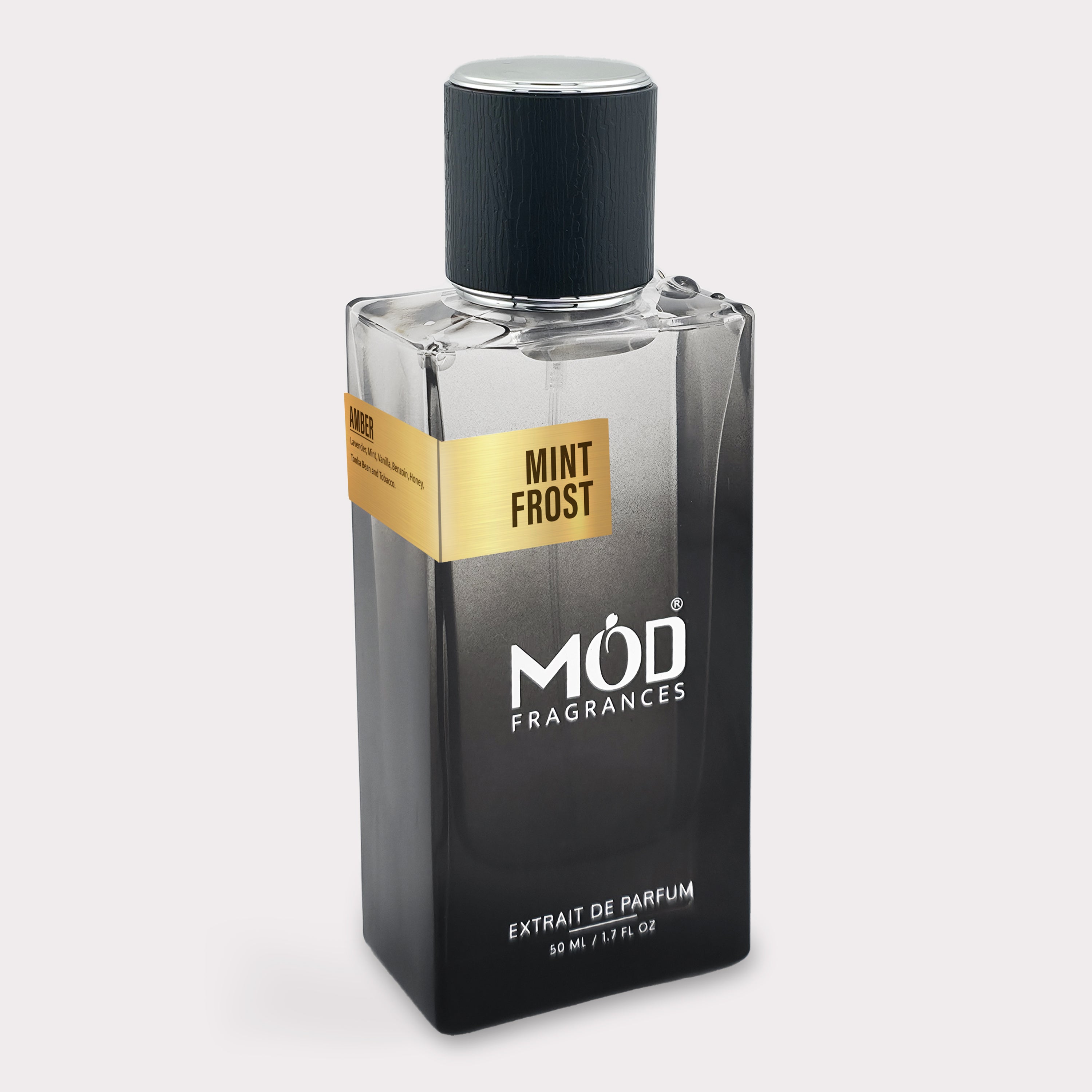Inspired by Le Male elixir Perfume bottle labeled 'Mint Frost' by MOD Fragrances on a light gray background