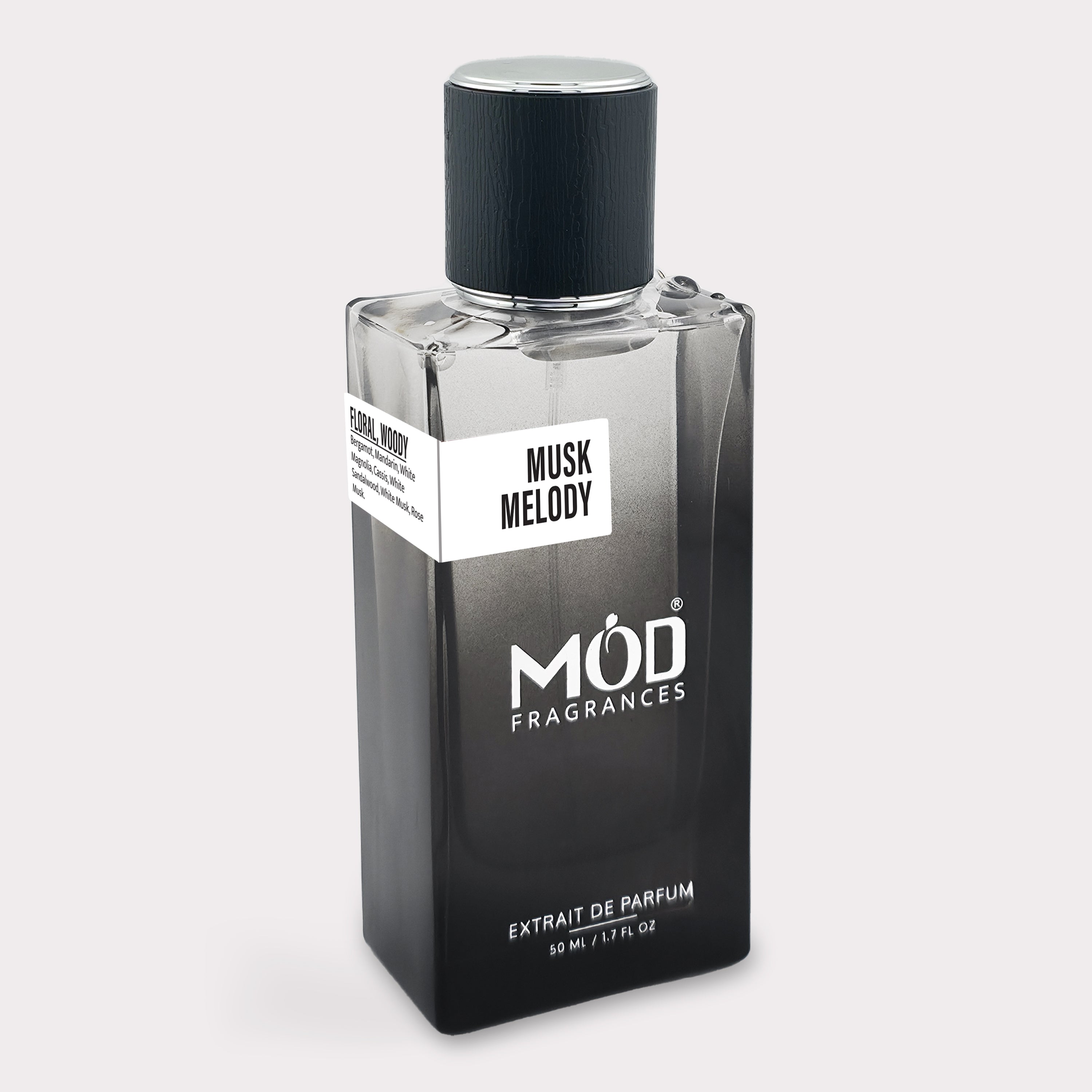 Musk Therapy Dupe Perfume bottle labeled 'Musk Melody' by MOD Fragrances on a white background