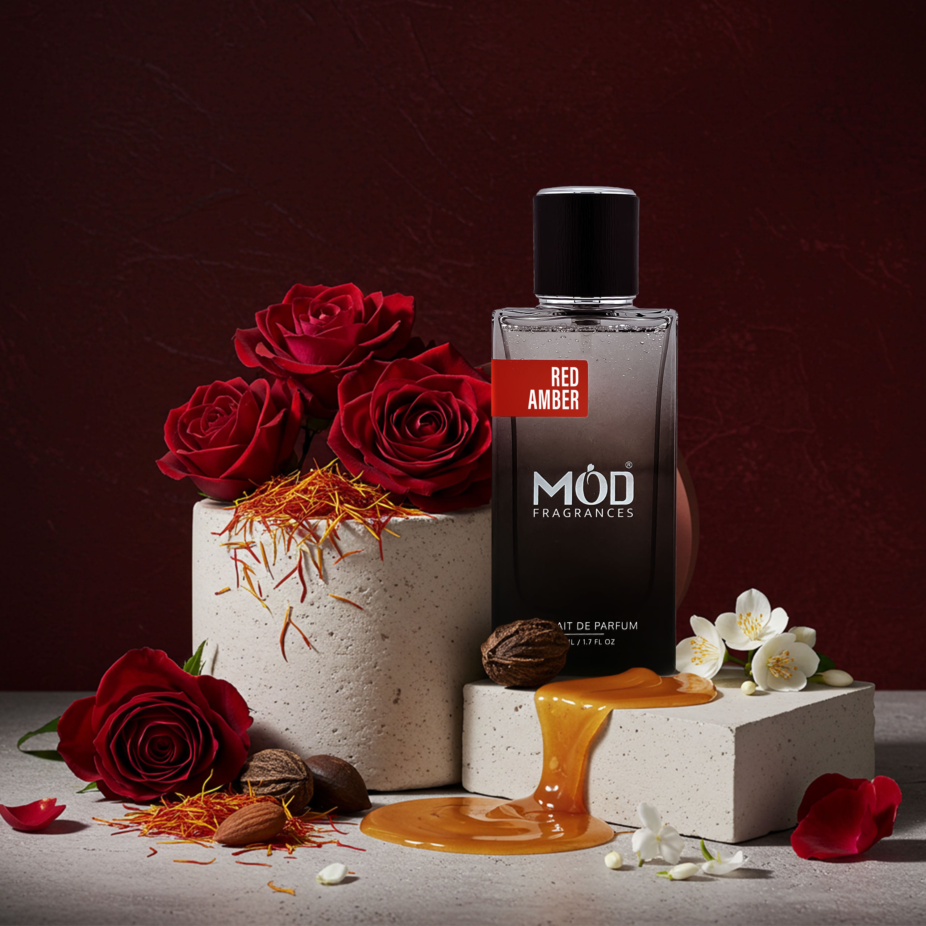 Möd Fragrances Red Amber perfume bottle with red roses and flowers on a dark background