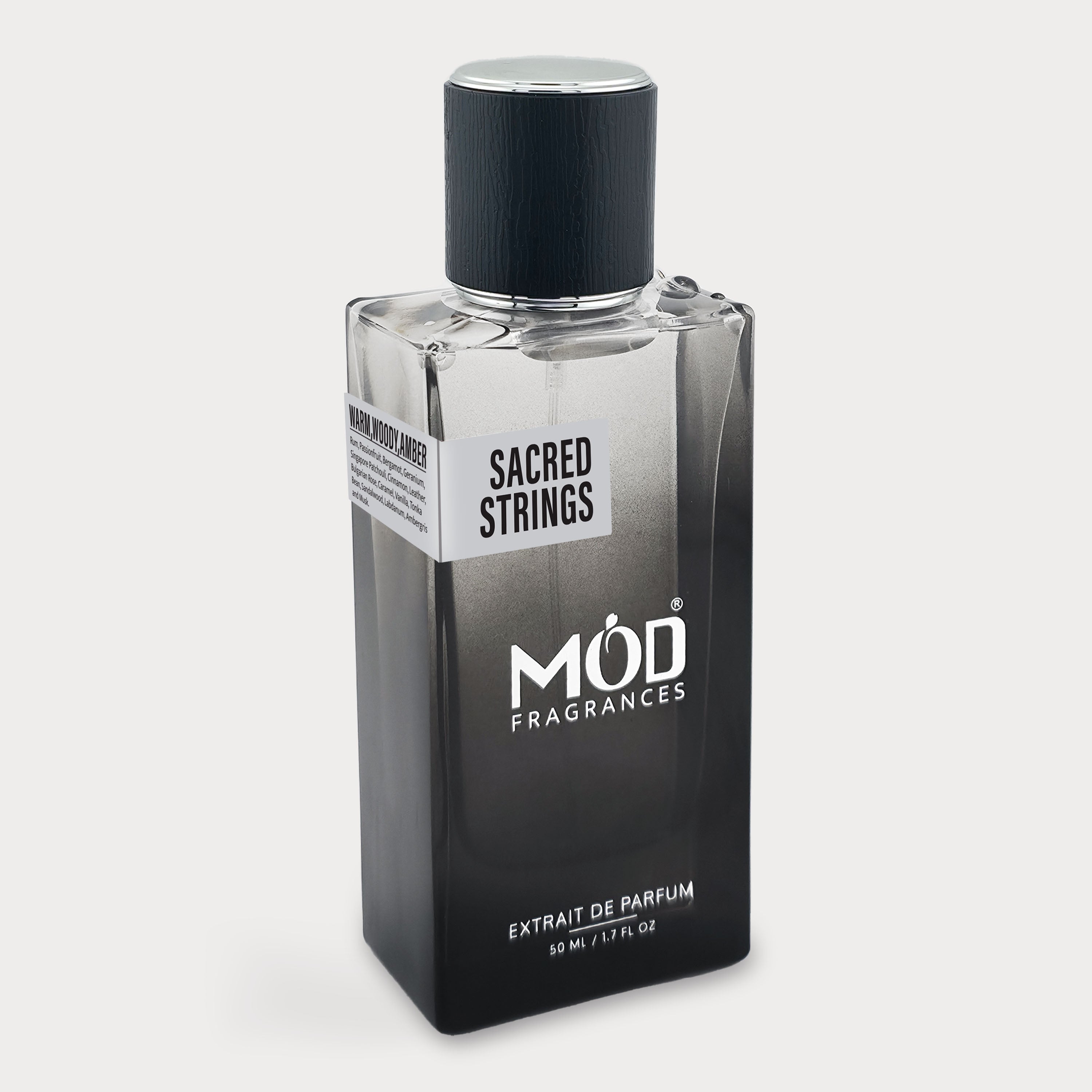 Perfume bottle labeled 'The Grand Move' by MOD Fragrances on a white background