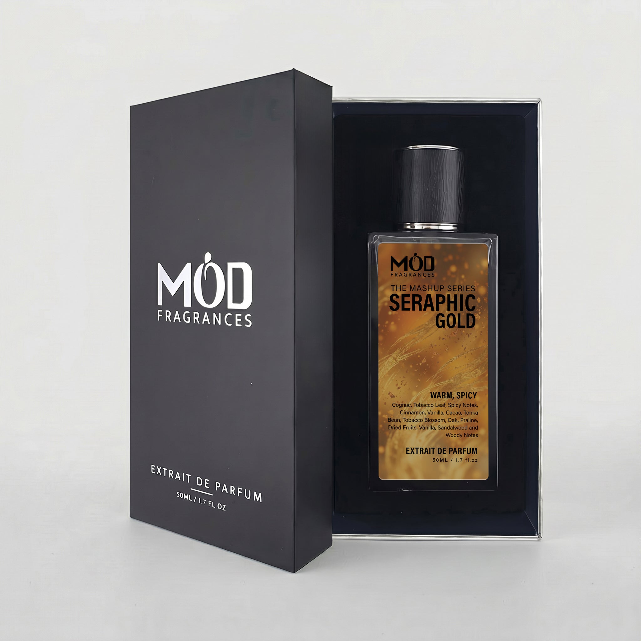 An open premium black perfume box reveals a rectangular glass bottle labeled “Mashup series Seraphic Gold” by MOD Fragrances, resting securely in a black-lined presentation case.