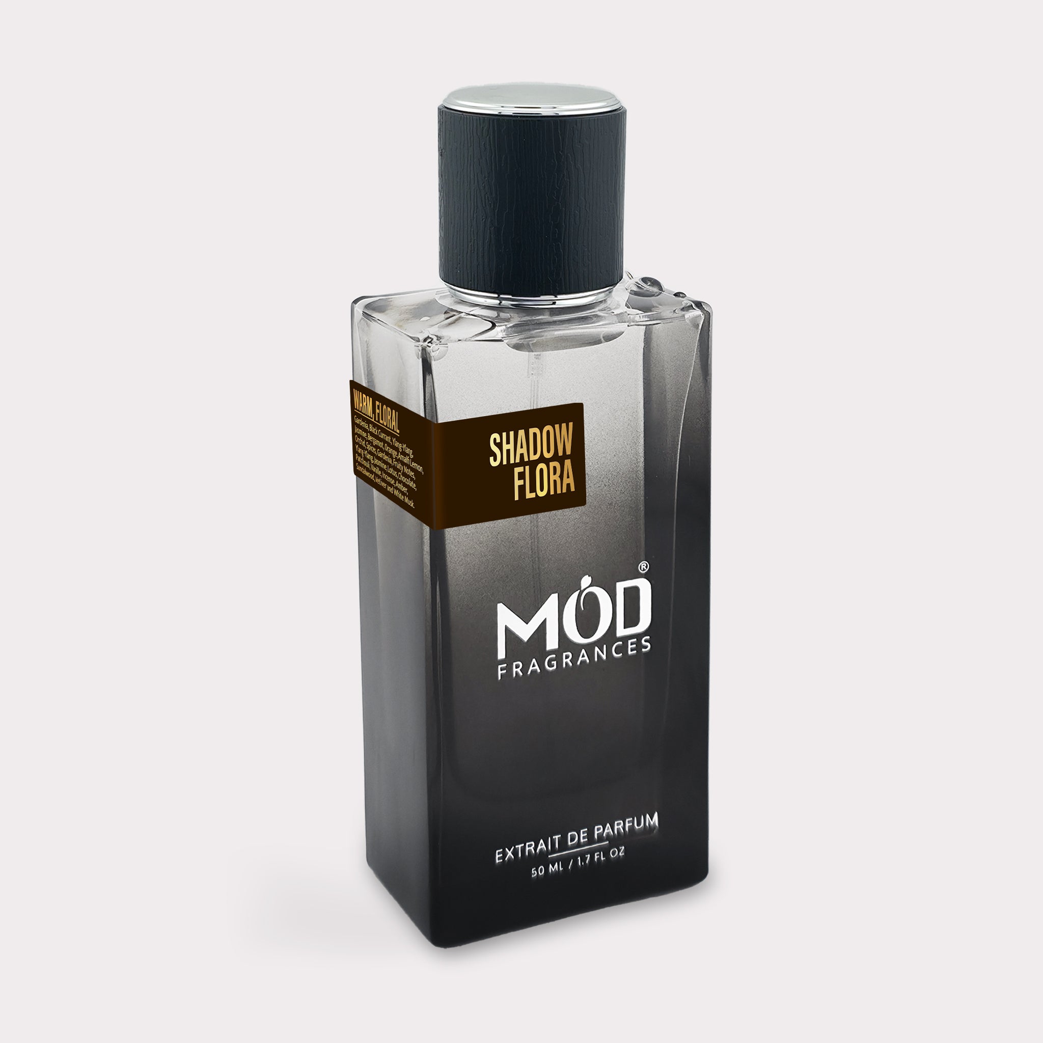 Perfume bottle labeled 'Shadow Flora' by 'MOD Fragrances' on a light gray background