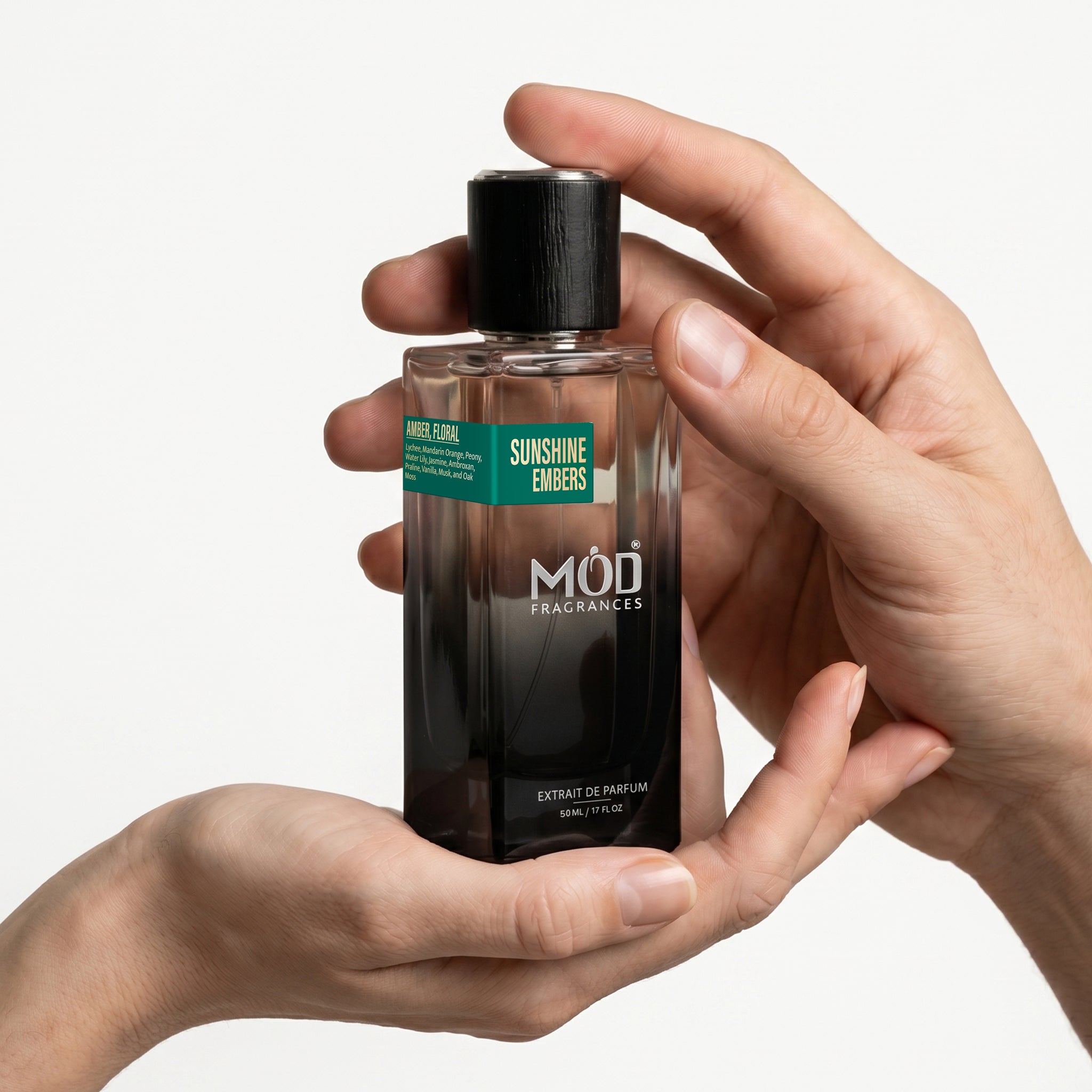 Inspired by Greenwich Village Perfume Dupe. Sunshine Embers by Mod Fragrances Unisex hands holding