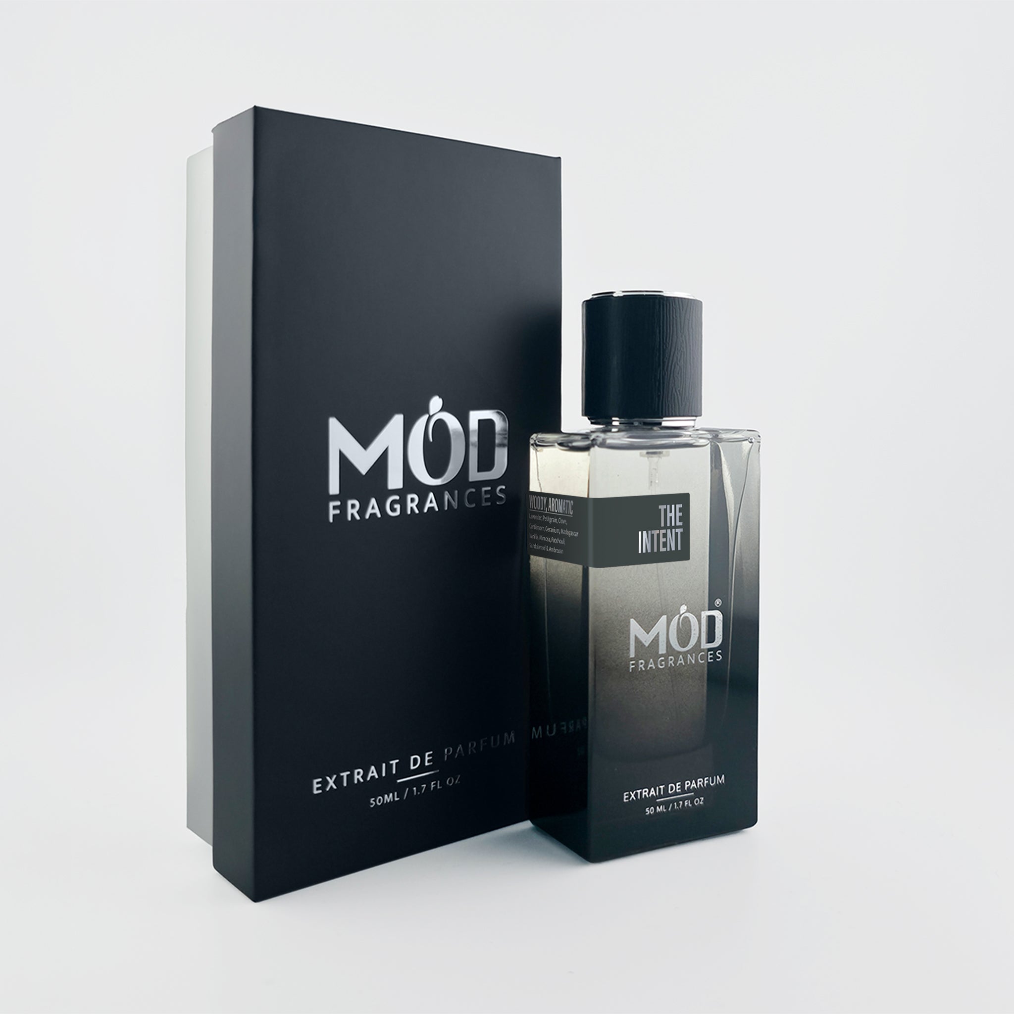 The Intent perfume bottle sitting next to its elegant Mod Fragrances packaging box.