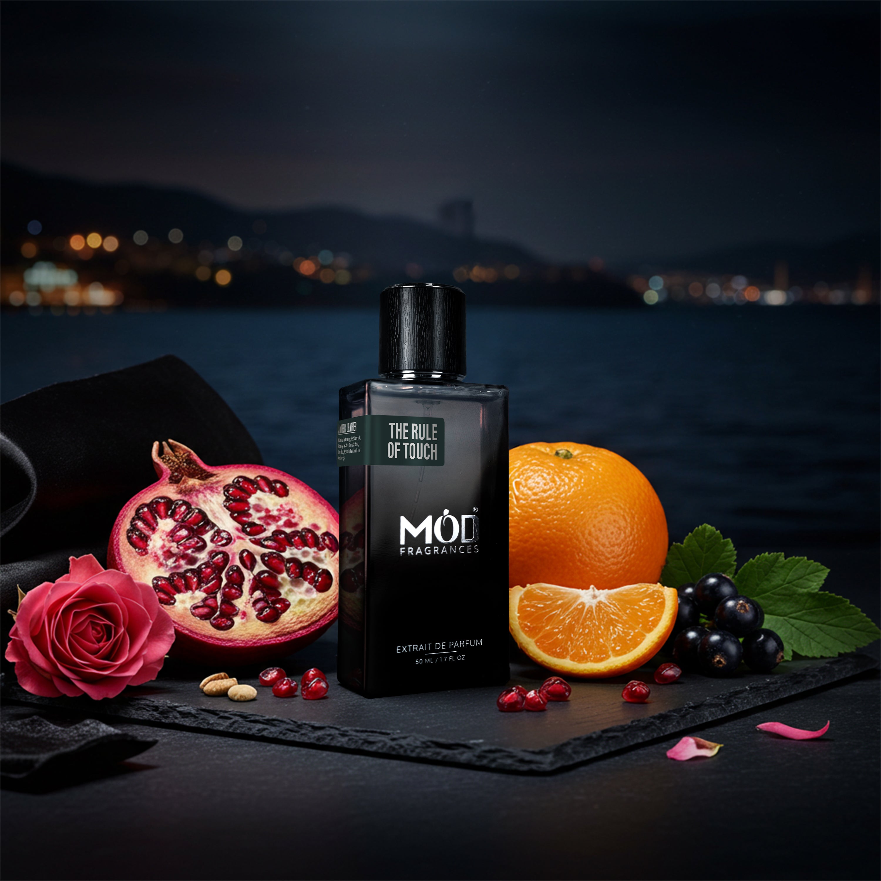 Inspired by Mind Games J'Adoube Perfume Dupe The Rule of Touch by Mod Fragrances Black Perfume Bottle along with Fruits, Orange and Berries