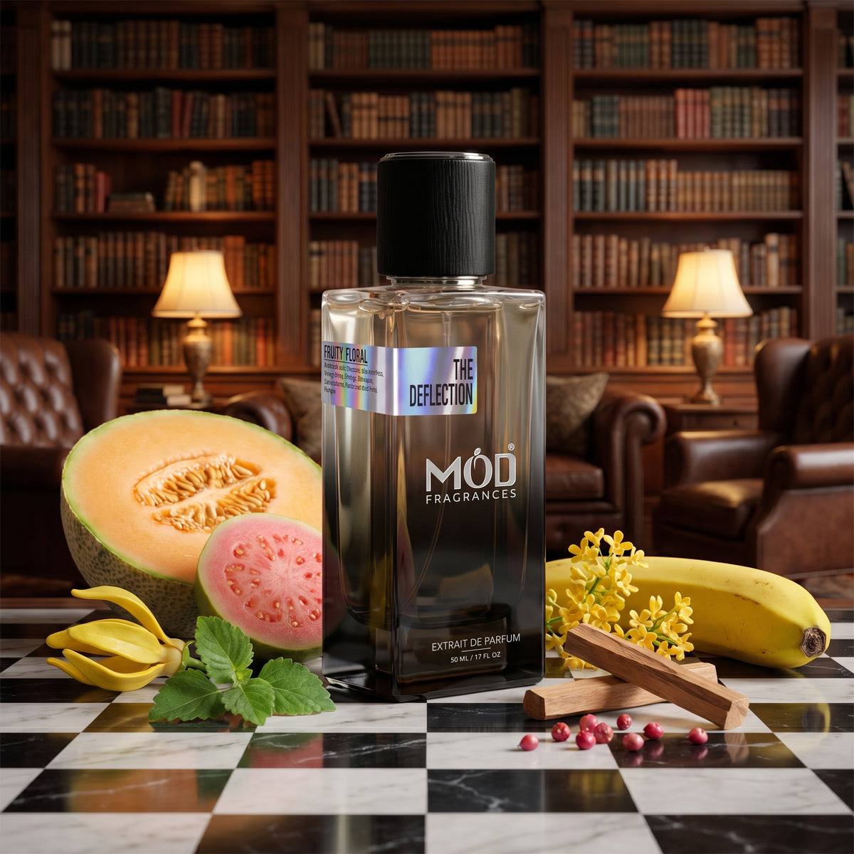A bottle of MOD Fragrances 'The Defector' extrait de bananier is displayed on a checkered marble surface, surrounded by fresh fruit (melon, guava, banana), mint leaves, and spices, with a cozy library background.